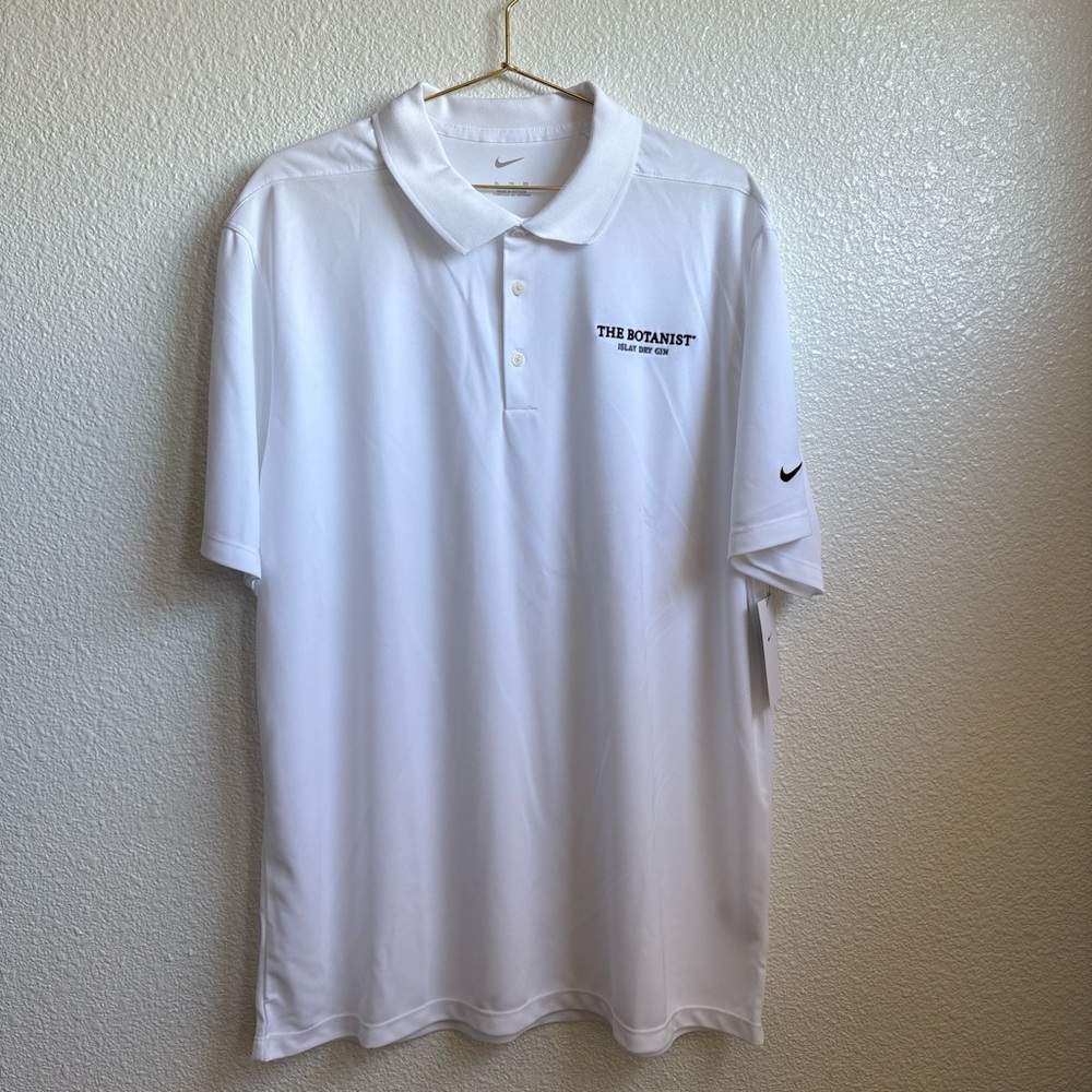 Nike White Men’s golf Polo with The Botanist Logo, small stain shown in last pic